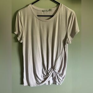 Athleta light lavender Women's Top with twist on side. Color is a light purple